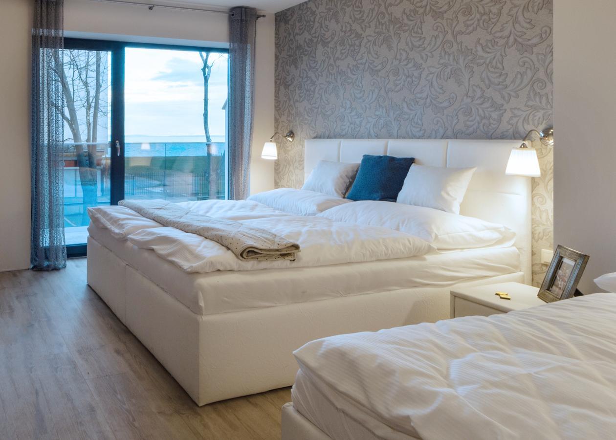 Deluxe Triple Room Lake View,665730855:JPEG
